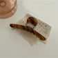 Top view of Beau chic acetate claw clip showing smooth rounded edges