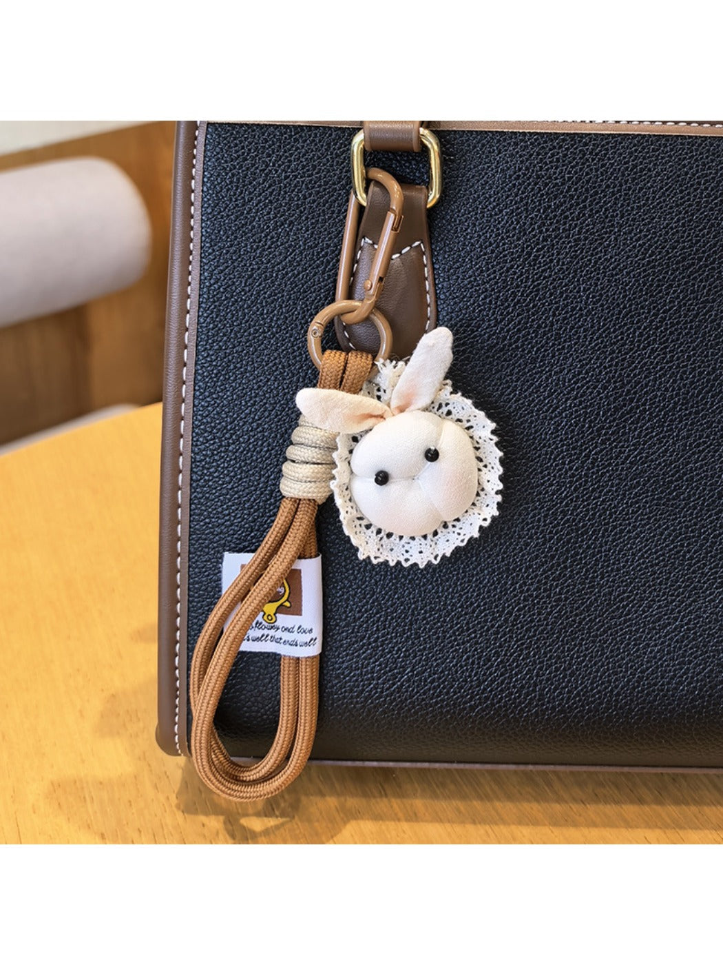 Bunny bag charm keychain displayed on a white background with soft shadows
