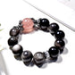 Side view of Lovra minimalist black crystal beaded bracelet showing bead details
