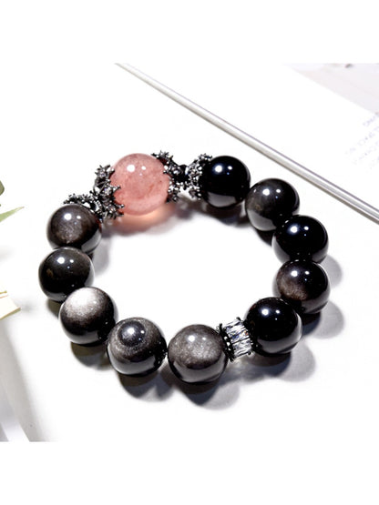 Side view of Lovra minimalist black crystal beaded bracelet showing bead details