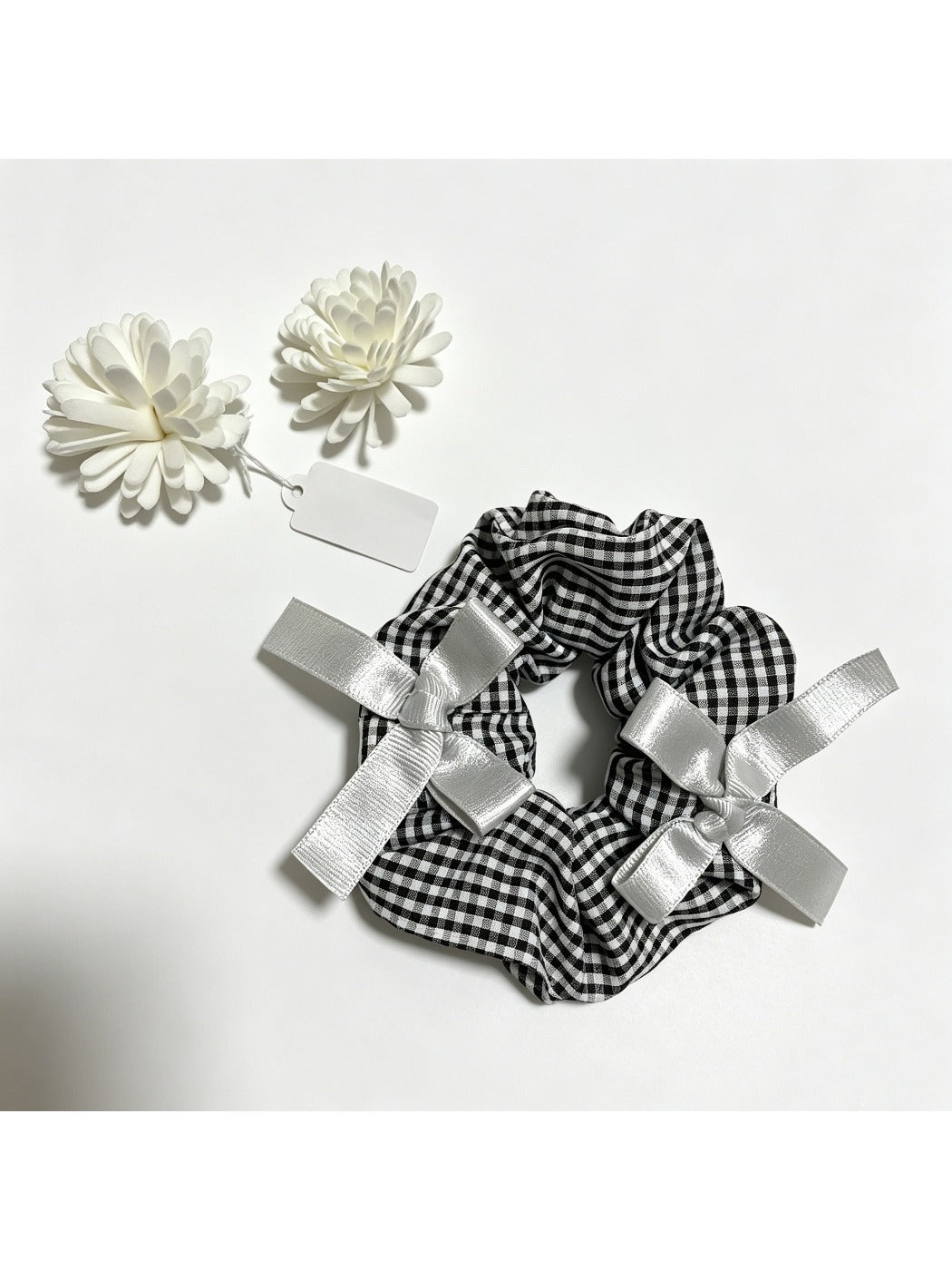 Gifty Sweet Bow Embellished Plaid Scrunchie showing bow detail and fabric texture