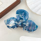 Beau bow hair claw clip displayed with matching hair accessories