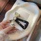 Beau - Faux Leather Bow Triangle Snap Hair Clip