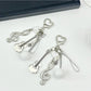 Close-up of Keypus music note keychain showing detailed musical note charm on silver keyring