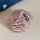 Beau hair clip styled in loose hair with natural lighting