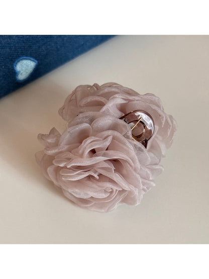 Beau hair clip styled in loose hair with natural lighting