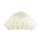 Beau leaf hair clip resting on a fabric surface