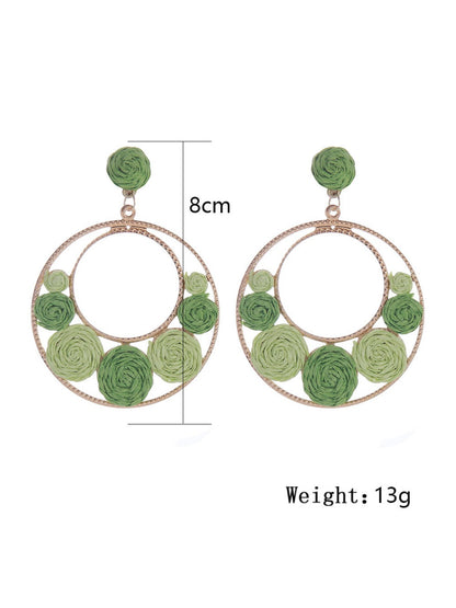 Side view of Sweet Raffia Circle Stud Earrings showing earring post