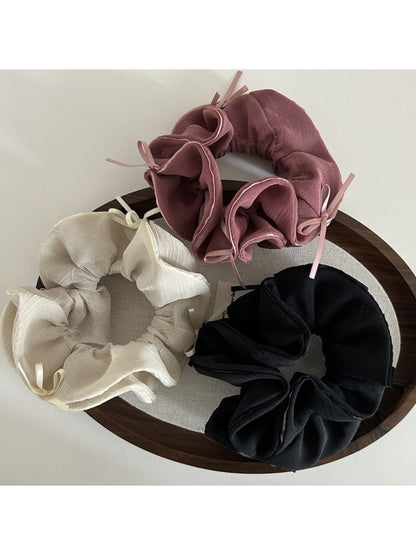 Gifty double layer chiffon bow scrunchie in soft pink on white background