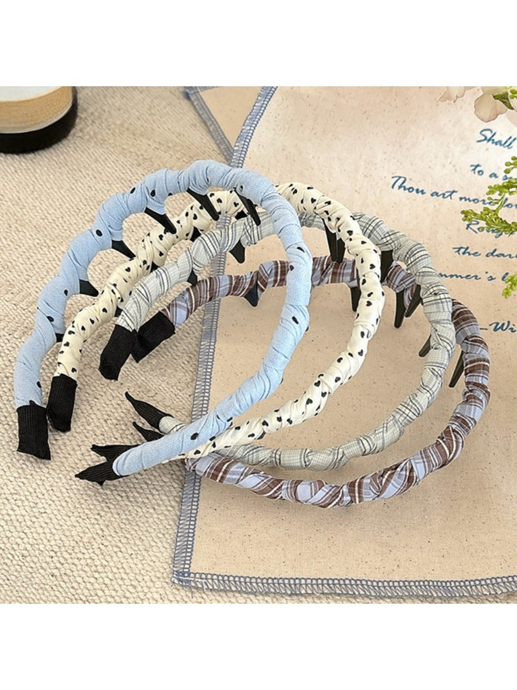 Polka dot headband in black and white with a simple knot design
