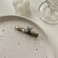 Beau acetate hair clip open showing metal clasp mechanism