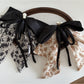 Beau Ink Wash Bow Ribbon Claw Clip held in hand to show size