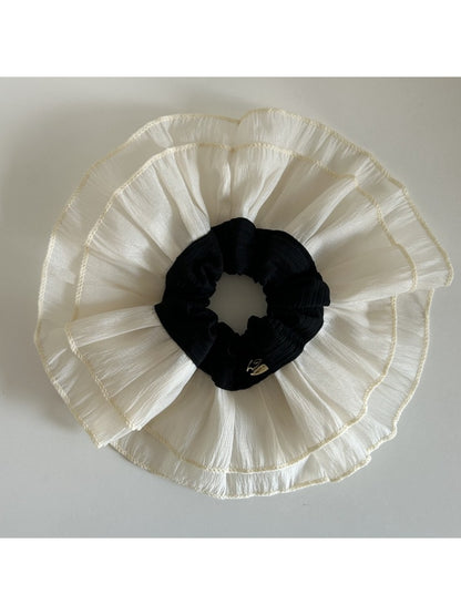 Double layer lace scrunchie displayed flat to show full size and design