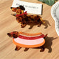 Beau cartoon dachshund shaped claw clip in brown and black colors on white background