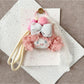 Back view of Keypus fabric doll keychain showing double ponytail hairstyle