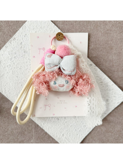 Back view of Keypus fabric doll keychain showing double ponytail hairstyle