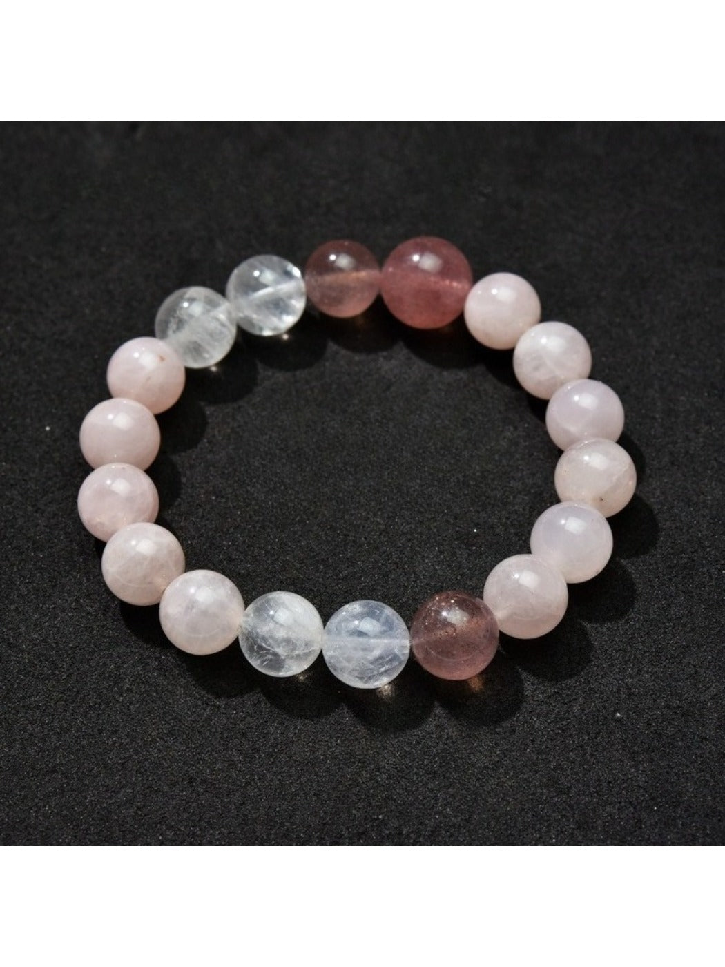 Lovra minimalist beaded bracelet paired with other simple jewelry on wrist