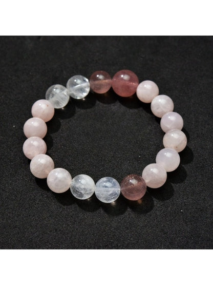 Lovra minimalist beaded bracelet paired with other simple jewelry on wrist