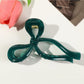 Beau - Large Hollow Out Bow Style Claw Clip