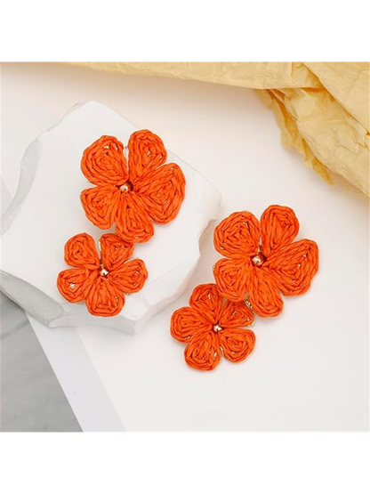 Earedge floral pendant raffia drop earrings displayed with matching accessories