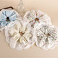 Gifty sweet printed patchwork scrunchie with floral and geometric patterns on fabric