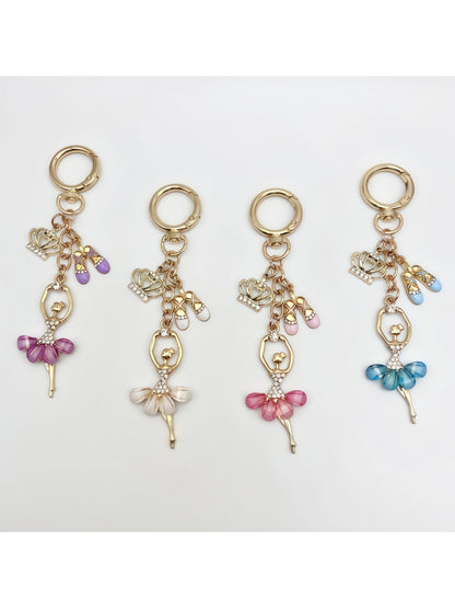 Delicate ballerina charm keychain with pink tutu and gold-tone metal ring