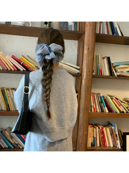 Side view of Gifty daily scrunchie showing gathered checked fabric