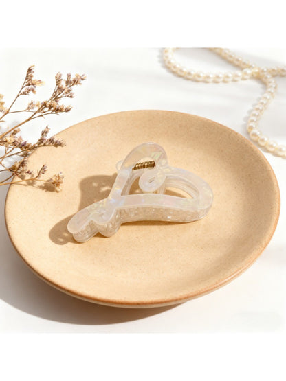 Beau heart shape hair claw worn in long hair, side profile
