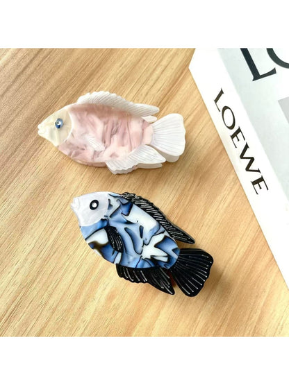 Side view of Beau fish shaped hair claw clip highlighting curved design
