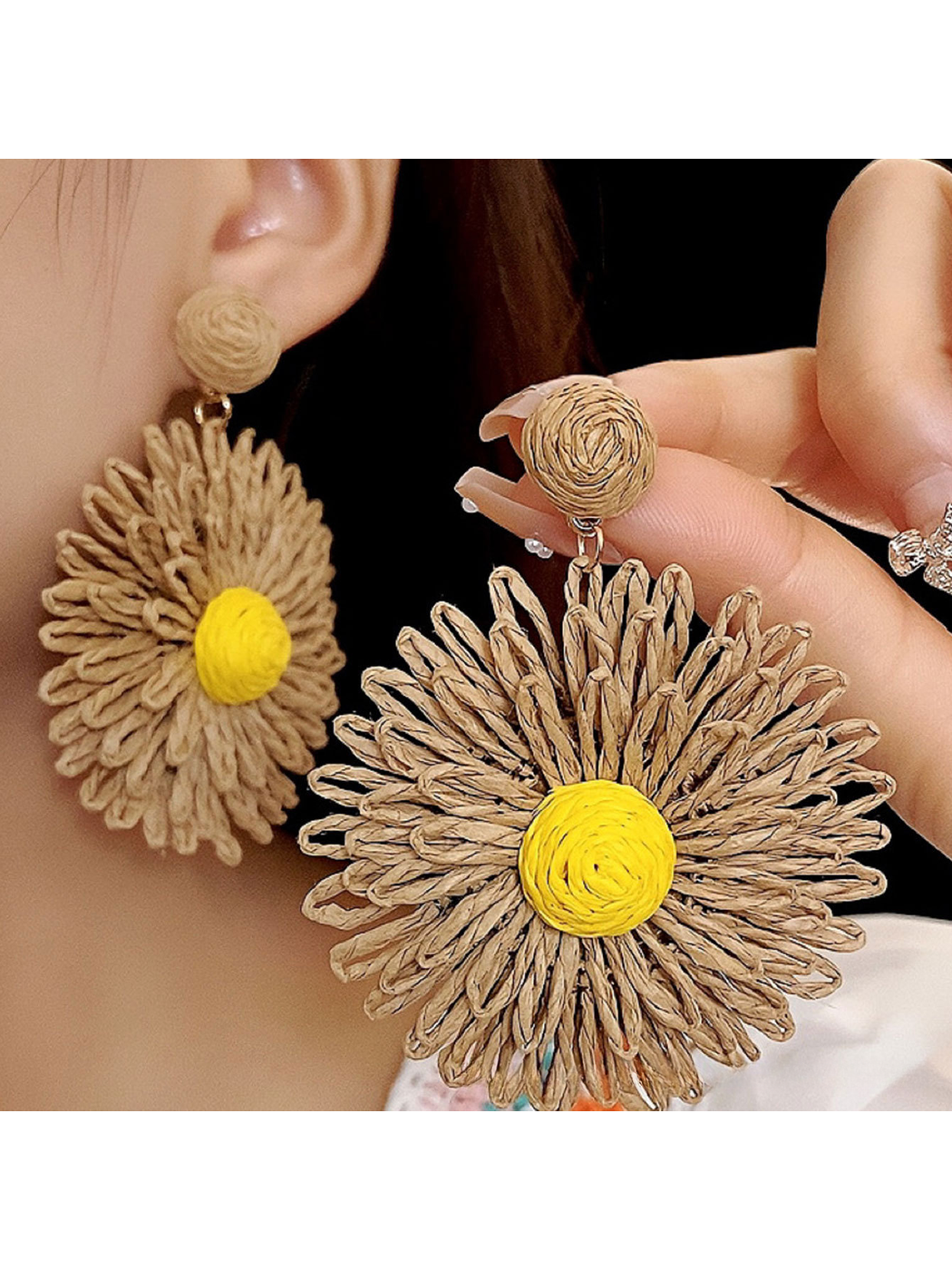Side view of colorful raffia earrings showing detailed floral design