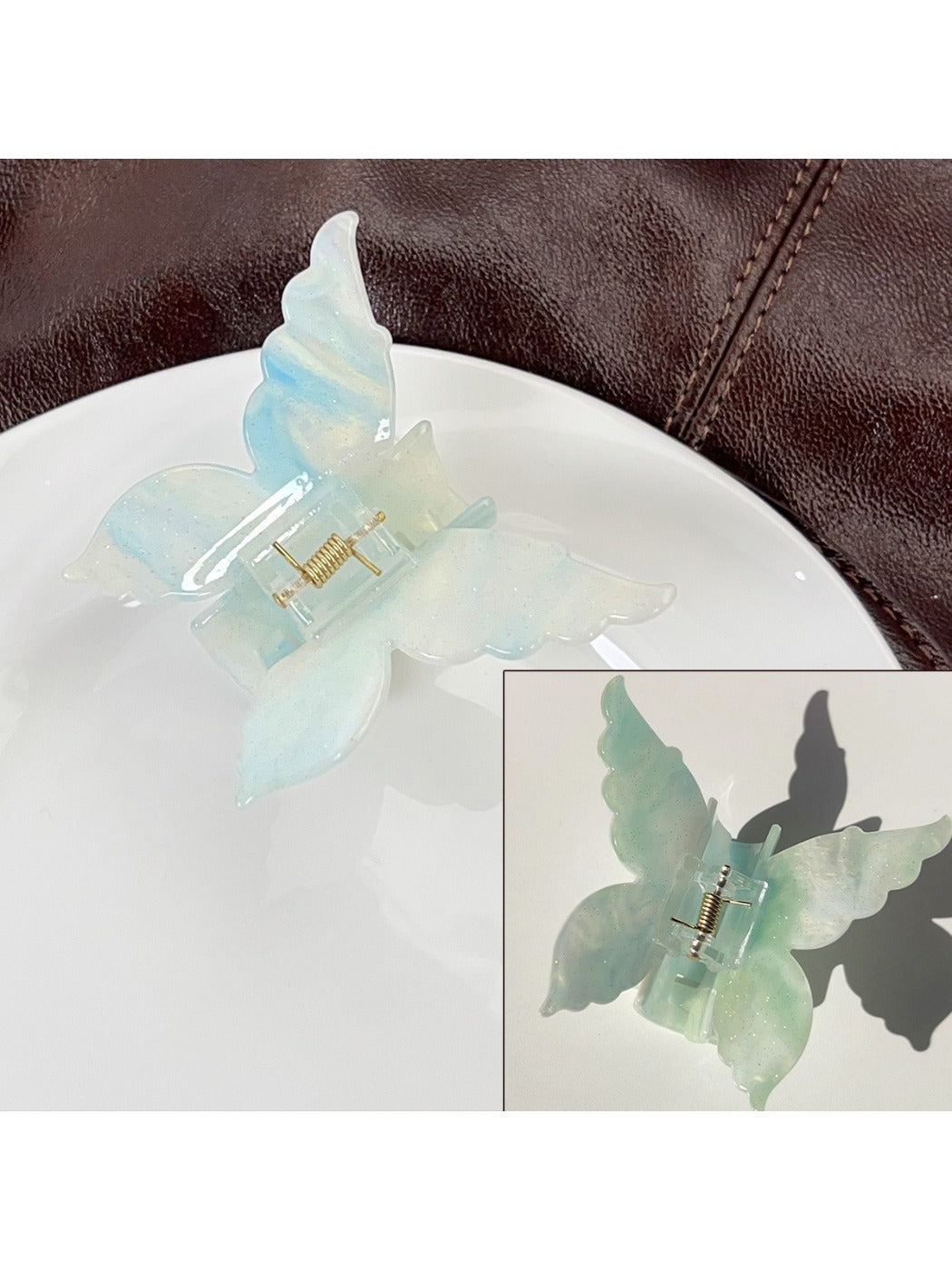 Top view of Beau butterfly shaped hair claw clip with gradient design