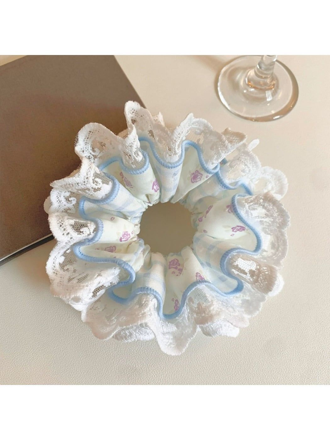Close-up of Gifty double layer tiny floral lace scrunchie in soft pink