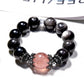 Close-up of Lovra minimalist black crystal beaded bracelet on a white background