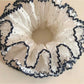 Side view of the Gifty sweet four tier ruffled scrunchie showing fabric texture
