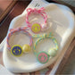 Gifty - Smiley Face Beaded Bow Elastic Hair Tie