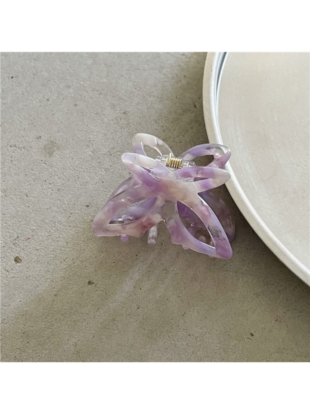 Beau Misty Acetate Butterfly Hair Clip clipped in blonde hair