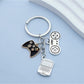 Close-up of Keypus keychain showing detailed buttons and joystick on game controller design