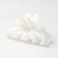 Beau hair clip in pastel pink with a glossy finish