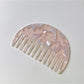 Camerow half round hair comb angled to show curvature and design