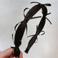 Gifty sweet ribbon bow headband styled with casual outfit on model