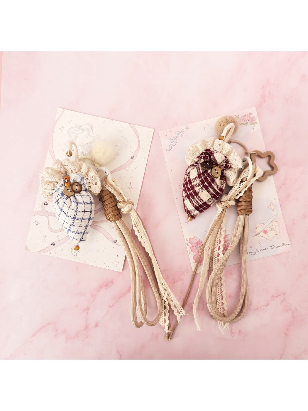 Strawberry-shaped umbrella keychain hanging from a metal keyring