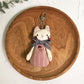 Silver cat charm keychain with engraved whiskers and eyes detail