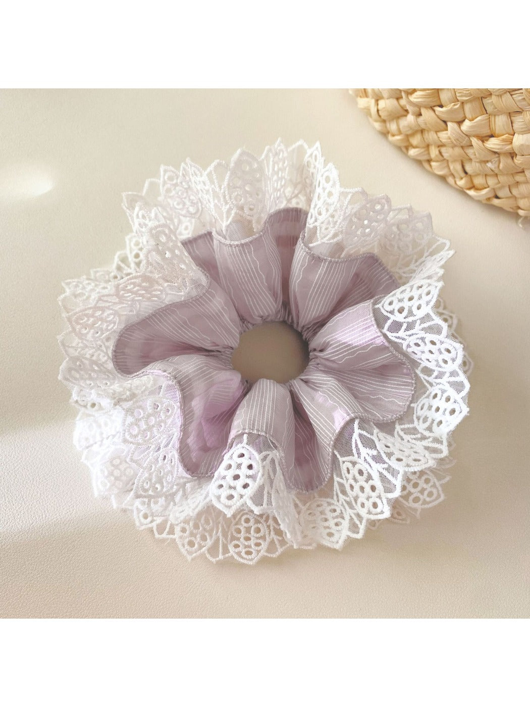 Gifty purple lace trim scrunchie displayed next to matching hair accessories
