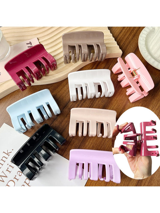 Beau plastic square claw clip in beige on white background