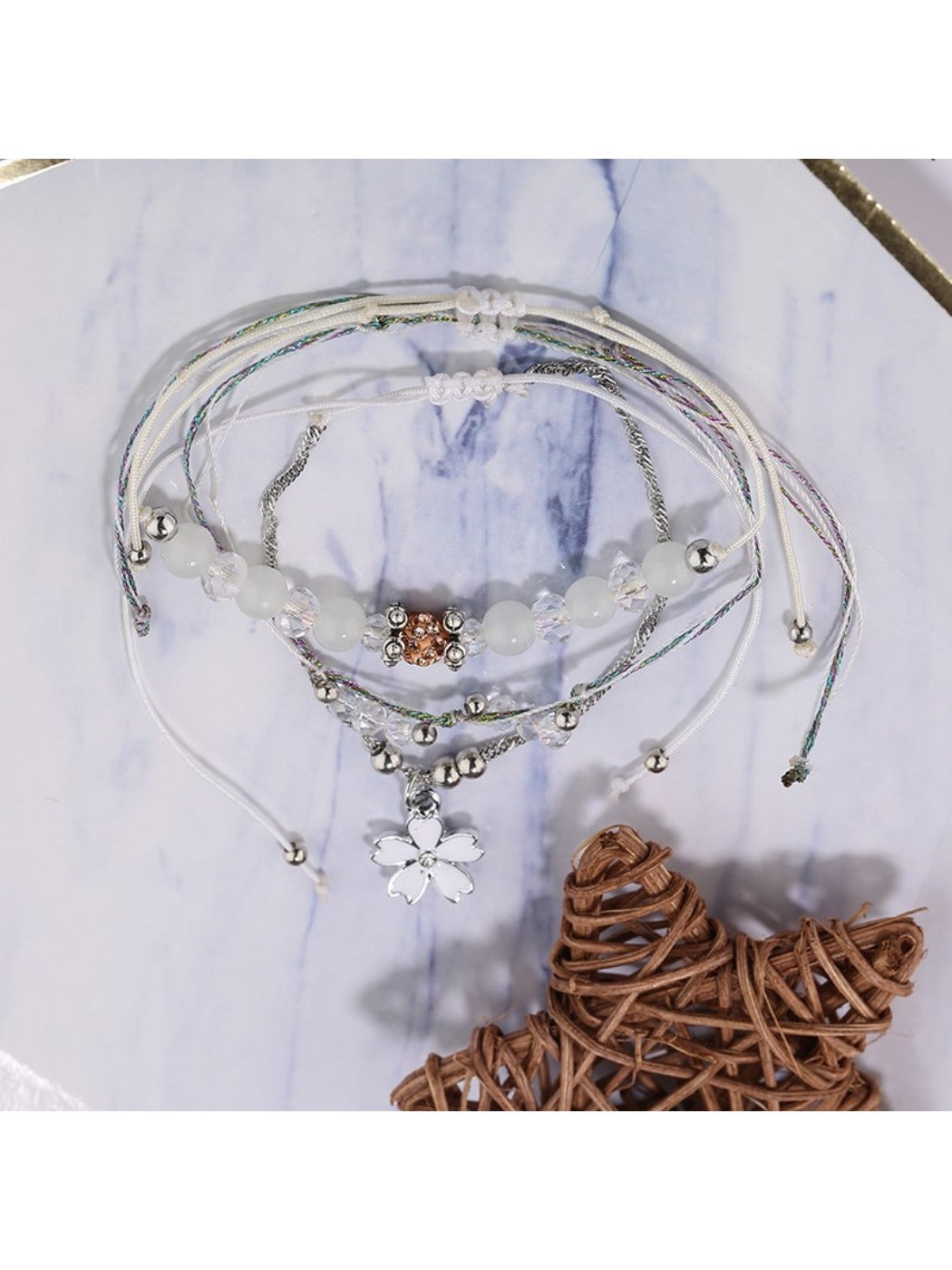Side view of Lovra minimalist small bead bracelet highlighting clasp design