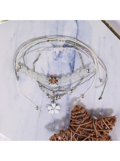 Side view of Lovra minimalist small bead bracelet highlighting clasp design