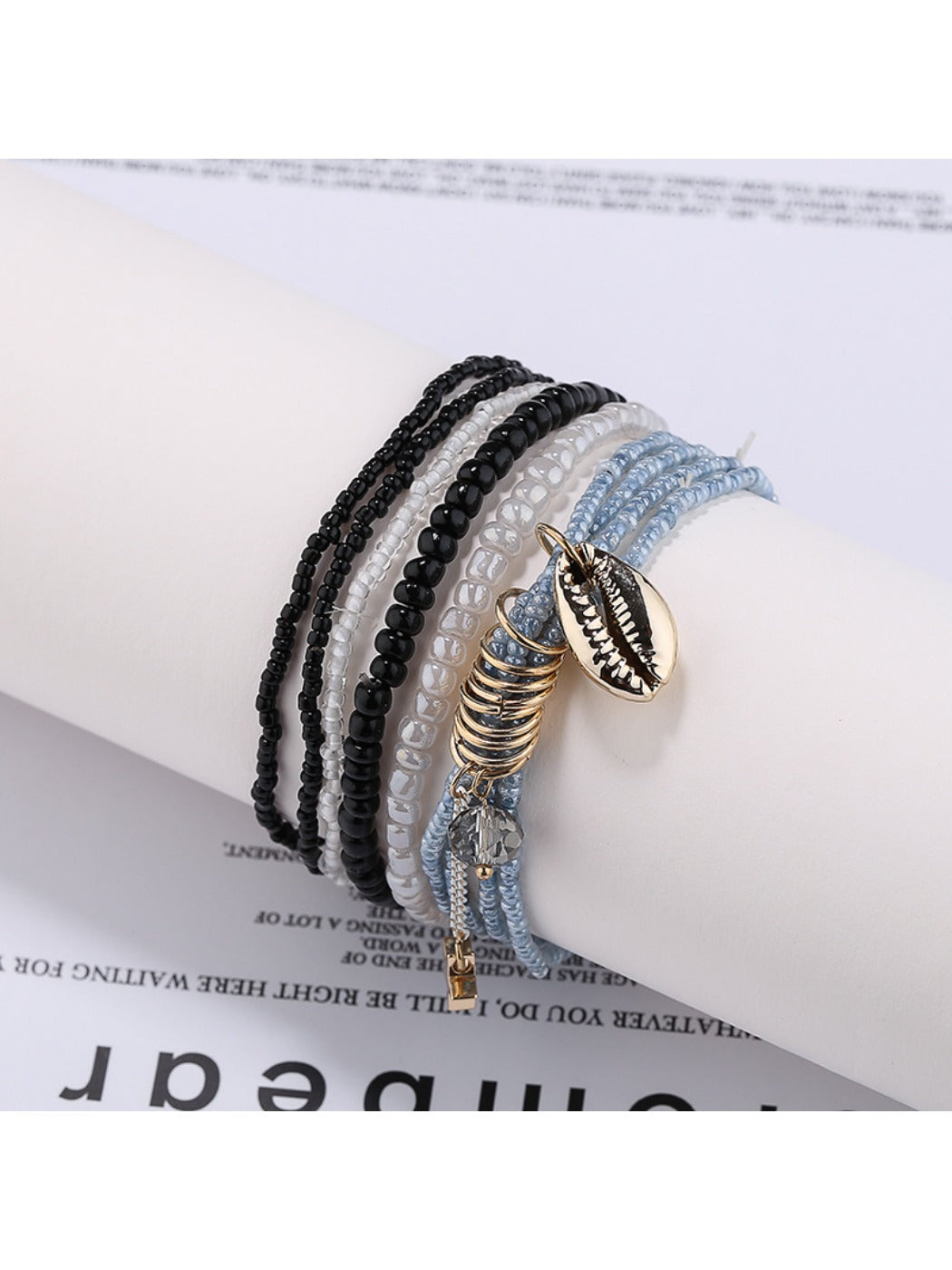 Side view of Lovra colorful beaded bracelet highlighting bead texture and layers