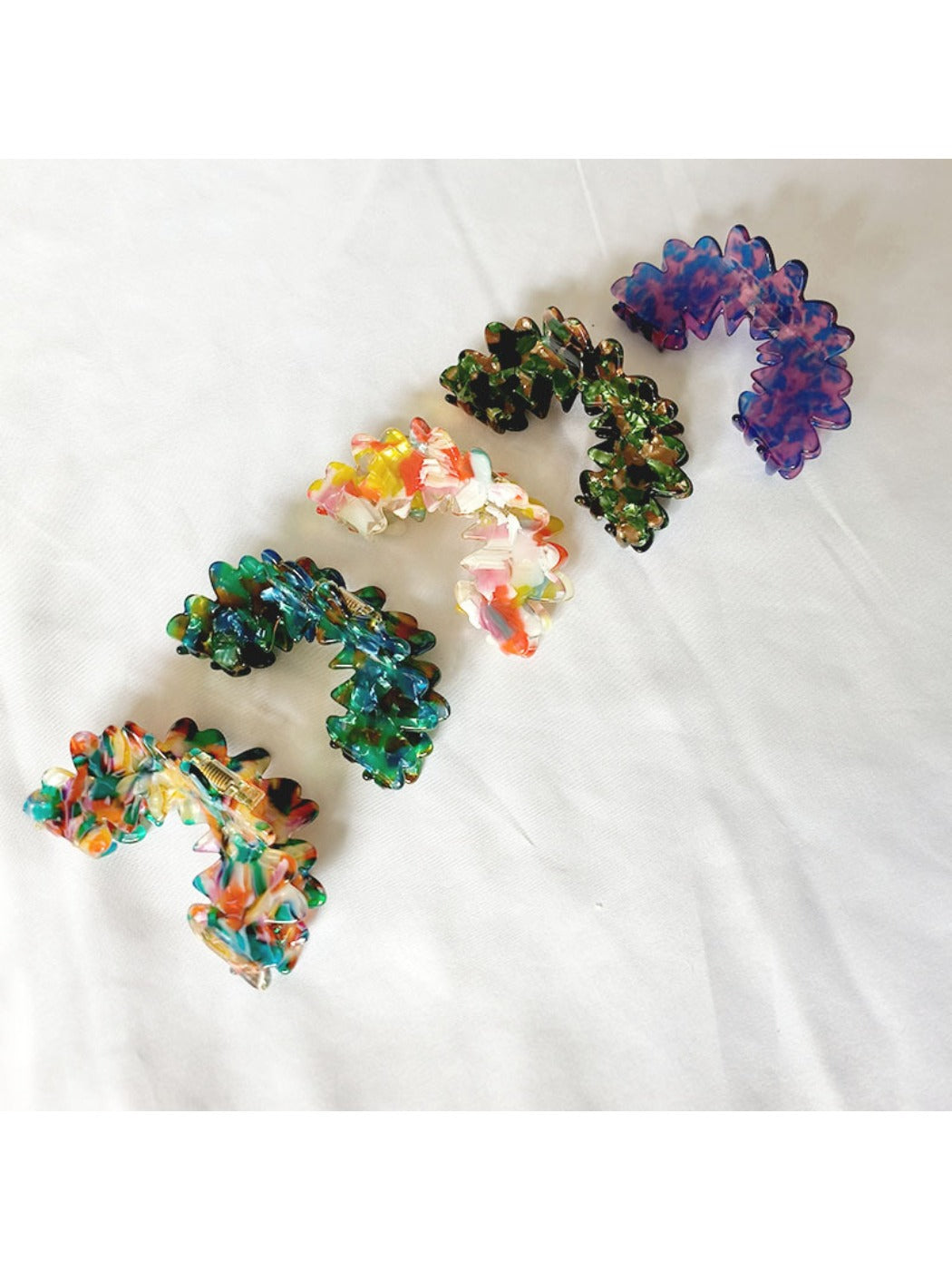 Side view of Beau Wave Cloud Shaped Claw Clip highlighting curved edges