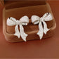Earedge - Synthetic Zircon Bow Stud Earrings Pair