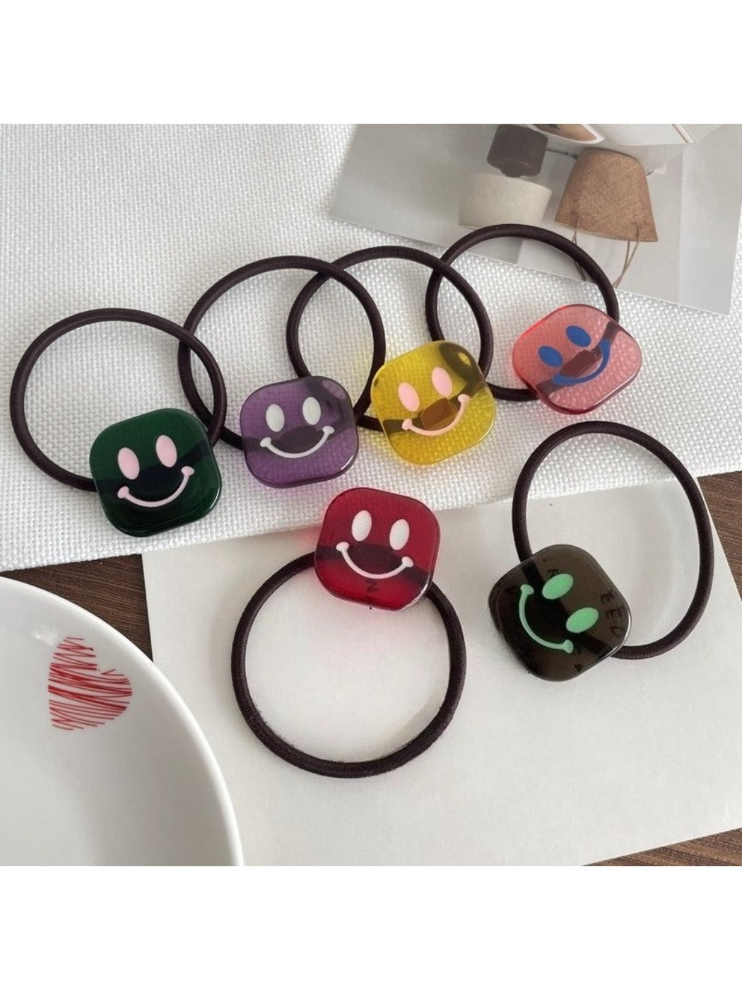 Gifty - Stylish Smiley Face Hair Tie